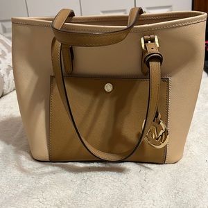 Tan/blush Michael Kors purse